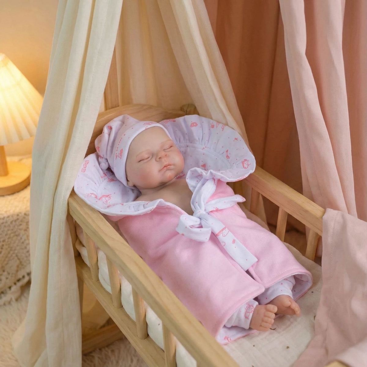 12 inch pink bag with pascale solid silicone reborn doll as a Christmas gift for children